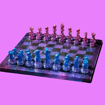 blue side view of Handcrafted cosmic purple and blue galaxy resin chess set with holographic glitter pieces by Crazy Chaotic Crafter.
