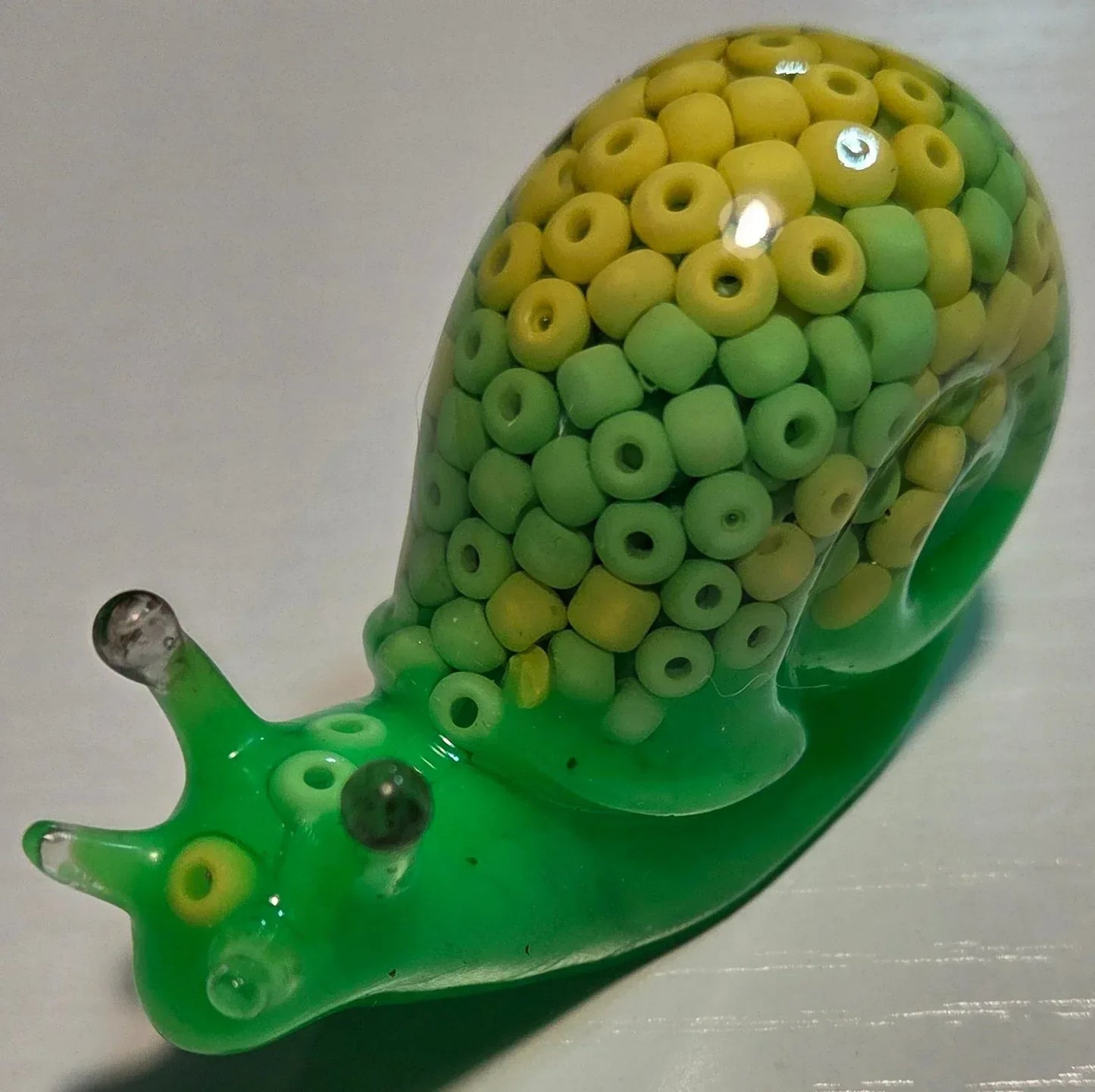 **Handcrafted Key Lime Beaded Resin Snail Figurine - Vibrant Green Maximalist Decor | Whimsical Artisan Desk Companion by Crazy Chaotic Crafter**