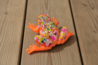 **Handcrafted Neon Orange Beaded Resin Frog Figurine - Vibrant Maximalist Animal Decor | Playful Desk Accessory by Crazy Chaotic Crafter**
