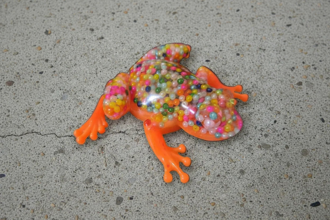 **Handcrafted Neon Orange Beaded Resin Frog Figurine - Vibrant Maximalist Animal Decor | Playful Desk Accessory by Crazy Chaotic Crafter**