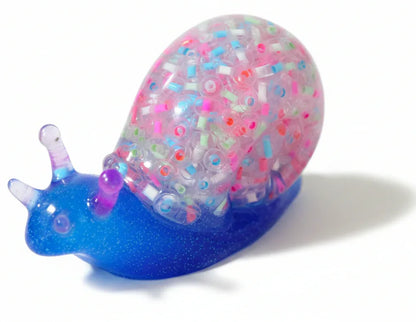 **Handcrafted Blue Multicolor Beaded Resin Snail Figurine - Rainbow "Skittles" Maximalist Decor | Whimsical Artisan Desk Pet by Crazy Chaotic Crafter**