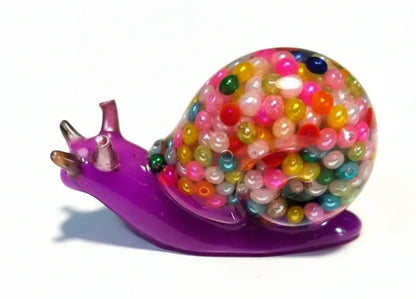 **Handcrafted Bright Violet Multicolor Beaded Resin Snail Figurine - Rainbow "Gumball" Maximalist Decor | Whimsical Artisan Desk Pet by Crazy Chaotic Crafter**
